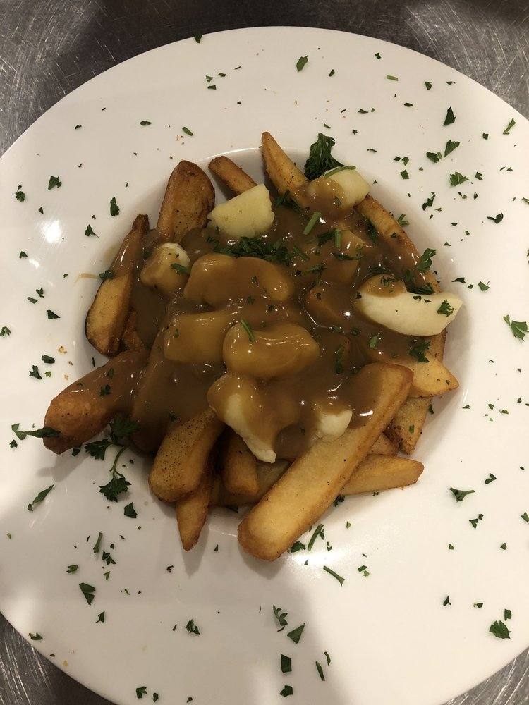 POUTINE (SAY POO-TEEN)